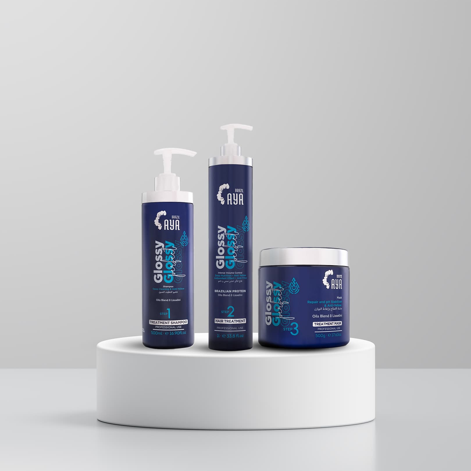 Aya Brazil hair care product set on a white pedestal with a gray background